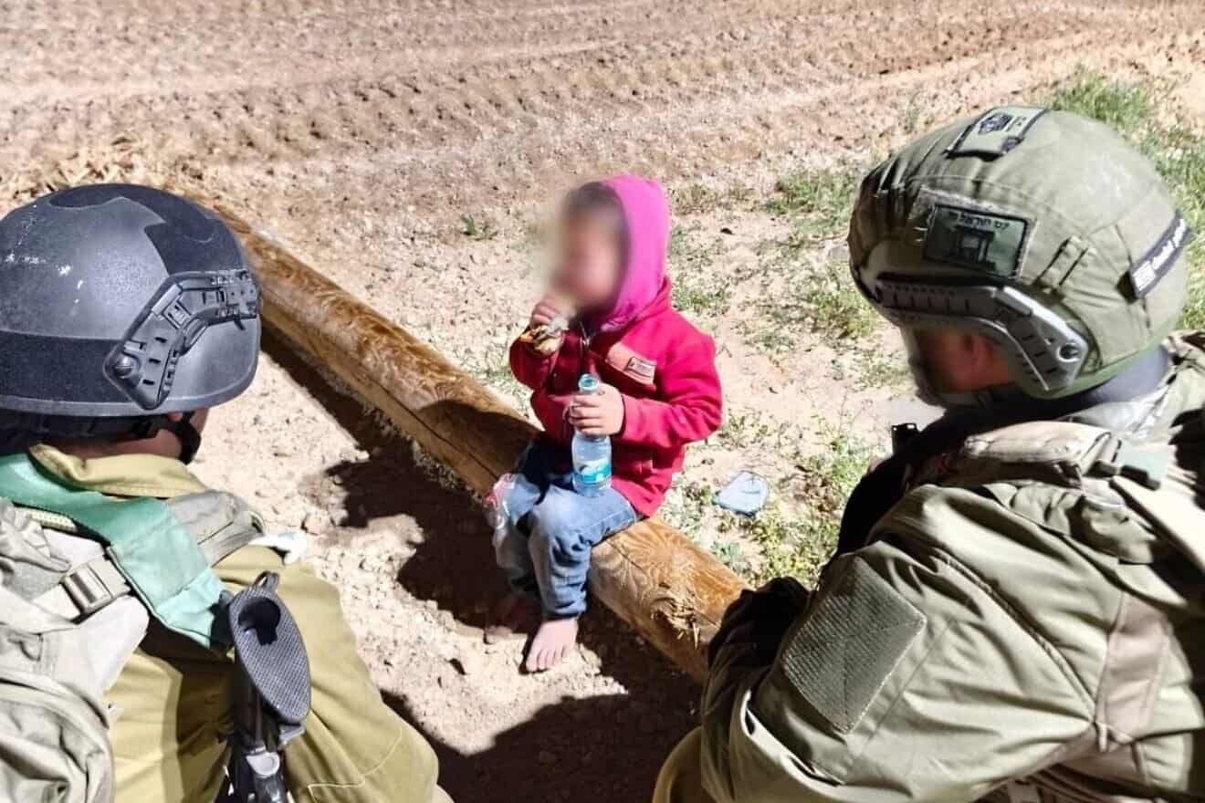 A child who said he was sent by Hamas is greeted by Israeli soldiers at an IDF post in the Gaza Strip on March 11, 2025. Credit: IDF.