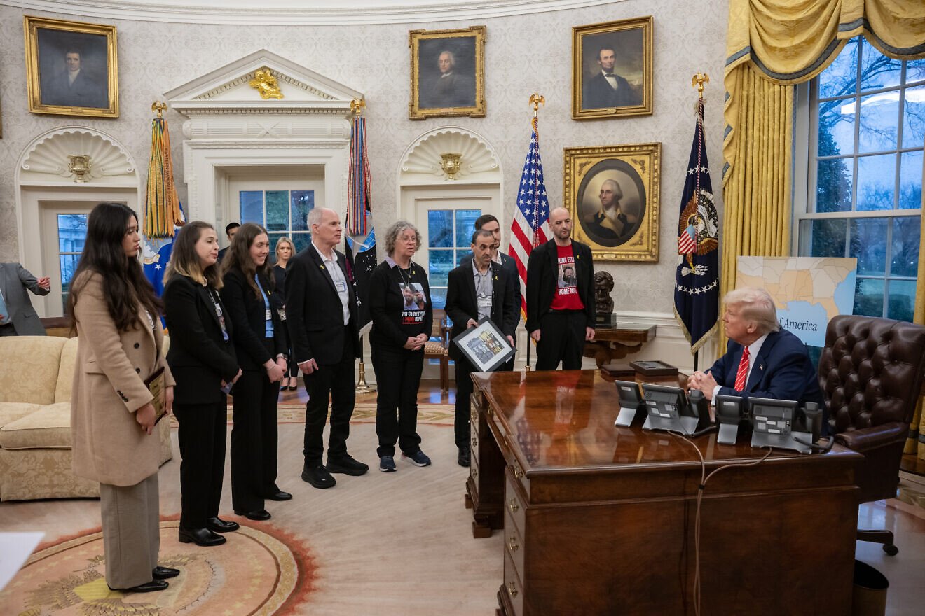 U.S. President Donald Trump meets with released hostages in the Oval Office at the White House on March 5, 2025. Credit: Molly Riley/White House.