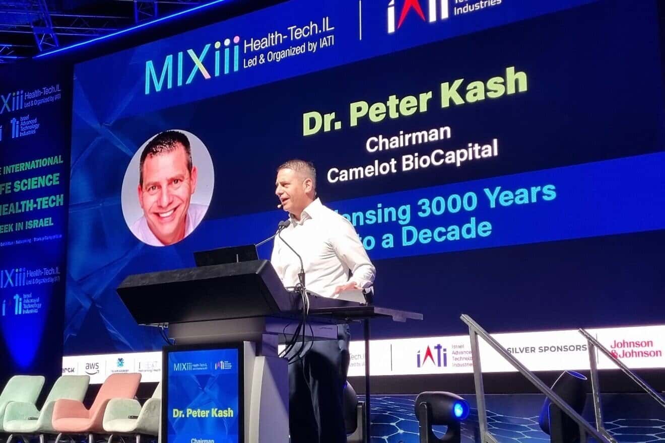Peter Kash addresses the IATI MIXiii Health-Tech.IL Conference in Jerusalem on March 5, 2025. Photo by Sharon Altshul.