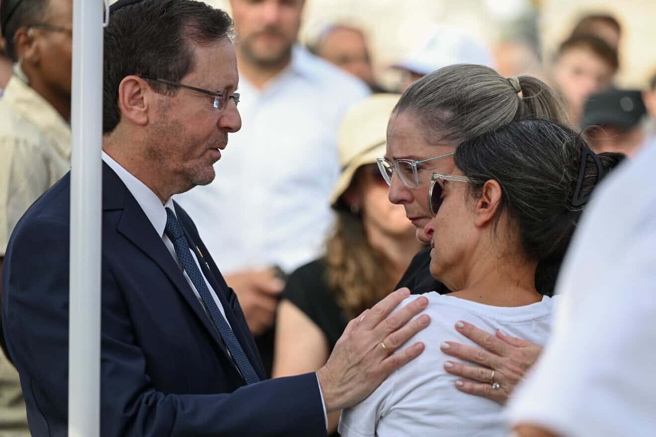 Israeli President Isaac Herzog comforts Rachel Goldberg-Polin, the mother of Hersh Goldberg-Polin, 23, who was captured on Oct. 7, 2023, by Hamas terrorists and murdered by them in the Gaza Strip in August 2024, at Hersh's funeral on Sept. 2, 2024. Credit: Maayan Toaf/Spokesperson unit of the President of Israel via Wikimedia Commons.