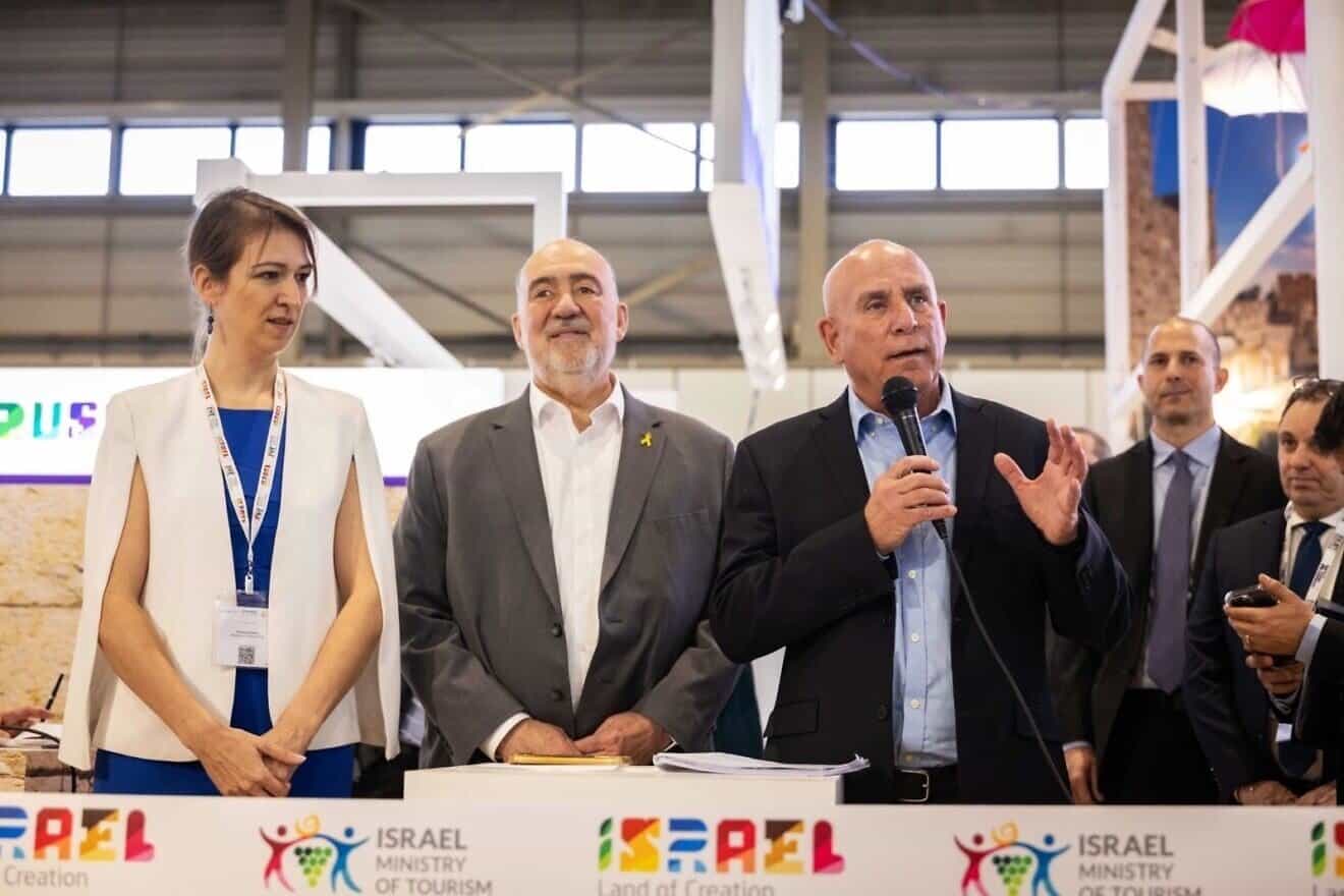 Ron Prosor, Israel’s ambassador to Germany (center) at the opening of the Israeli pavilion at the ITB fair in Berlin with Dani Shahar (right), director-general of the Israel Ministry of Tourism, March 2025. Photo by Boaz Arad.