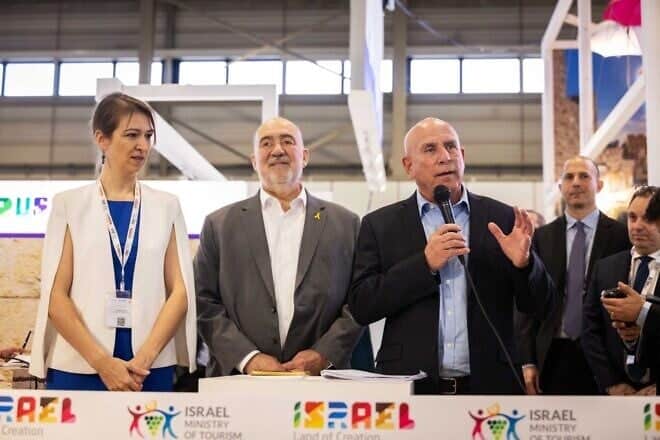 Ron Prosor, Israel’s ambassador to Germany (center) at the opening of the Israeli pavilion at the ITB fair in Berlin with Dani Shahar (right), director-general of the Israel Ministry of Tourism, March 2025. Photo by Boaz Arad.