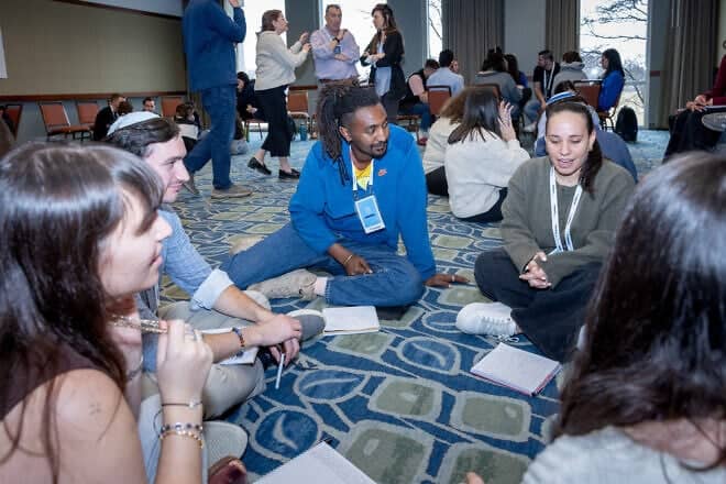 Birthright Israel Fellows process their day’s learning together. Credit: Courtesy of iCenter.