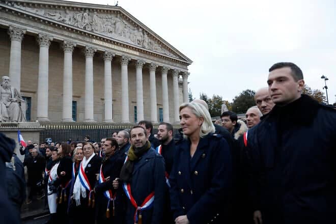 French far-right politician Marine Le Pen (second from right) and deputies including Sebastien Chenu to her right and Jordan Bardella, president of the National Rally (right) participate in a march against antisemitism from the Esplanade des Invalides to the Senate on Nov. 12, 2023 in Paris. Photo by Antoine Gyori-Corbis/Corbis via Getty Images.