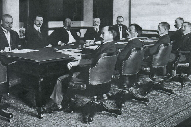 The Russian and Japanese delegations  meet during the Treaty of Portsmouth in 1905. Courtesy: P. F. Collier & Son via Wikimedia Commons.