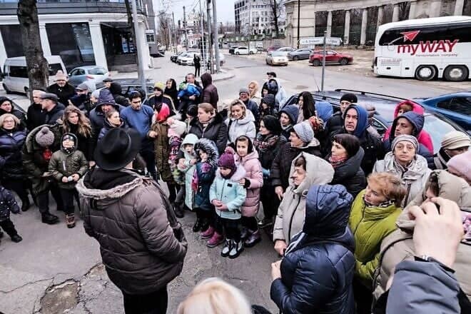 Ukrainian Jews in Moldova en route to Israel listen to Rabbi Yitzchak Halfon. Credit: Courtesy.