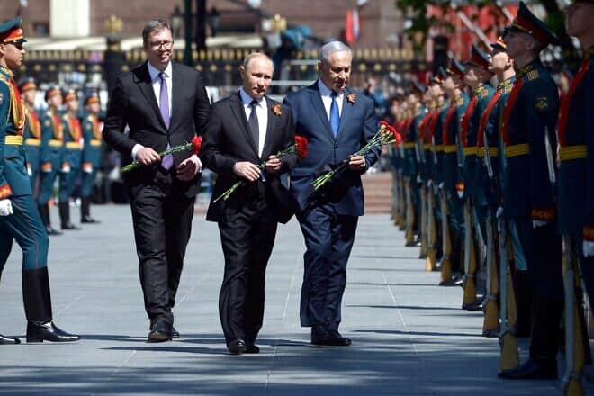Israeli Prime Minister Netanyahu, right, attends the Victory Day Parade in Moscow, Russia along with Russian President Vladimir Putin, center and Serb President Aleksandar Vucic on May 9, 2018. Photo by Amos Ben-Gershom (GPO).