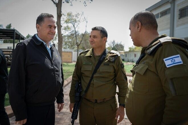Israeli Defense Minister Israel Katz, left, meets with Southern Command chief Maj. Gen. Yaniv Asor, center, and Deputy IDF Chief of Staff Maj. Gen. Tamir Yadai at the Gaza Division base near Re'im, March 25, 2025. Photo by Shira Keinan/Defense Ministry.