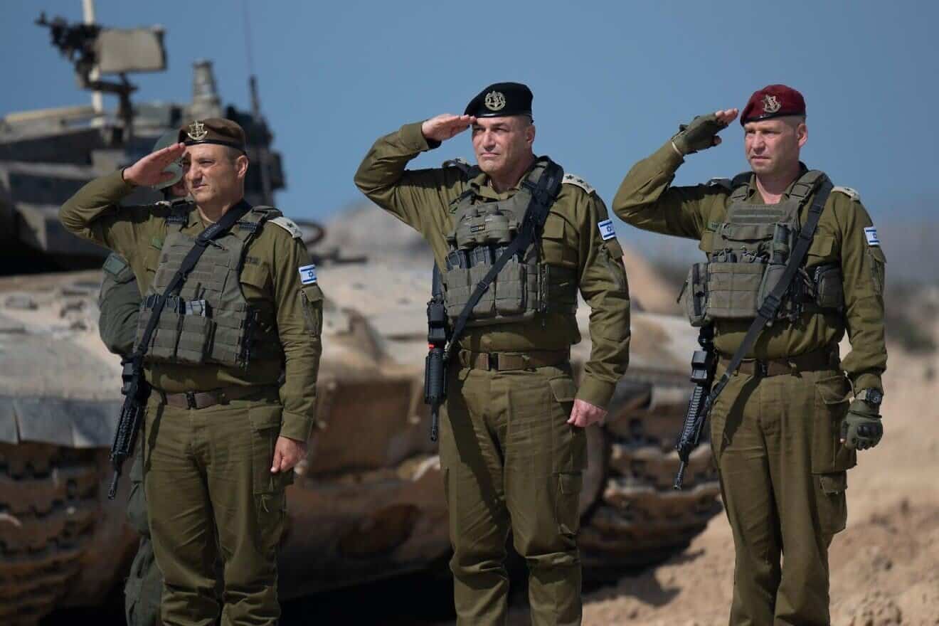 New IDF Southern Command commander Maj. Gen. Yaniv Asor, left, flanked by IDF Chief of Staff Lt. Gen. Eyal Zamir and former IDF Southern Command commander Maj. Gen. Yaron Finkelman, at the transfer ceremony in Gaza on March 12, 2025. Credit: IDF.