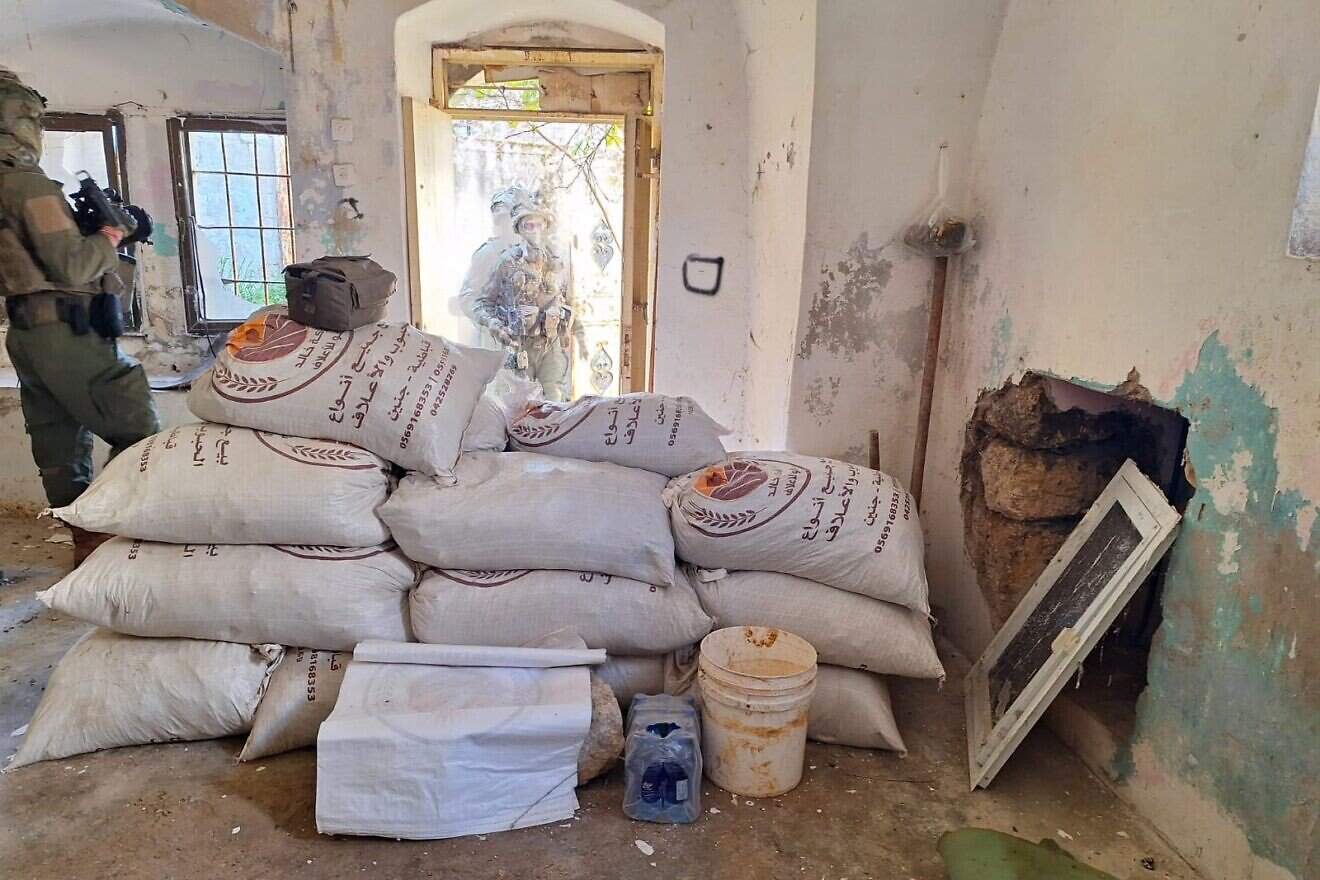 Israel Defense Forces soldiers seize bomb-making materials during a counter-terrorism raid in Qabatiya near Jenin in northern Samaria, March 12, 2025. Credit: IDF.