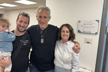 Daniel Silverman, a former security coordinator at Kibbutz Sa'ad, with Harold and Nan Klein, representing the Woodsburgh Minyan from Woodmere, NY, at Kibbutz Sa'ad, March 18, 2025.