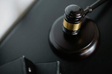 Close-up of a wooden gavel. Credit: Sora Shimazaki/Pexels.