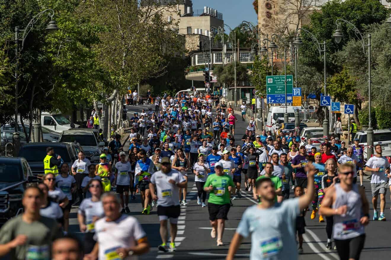 Thousands of runners take part in the annual Jerusalem Marathon on April 4, 2025. Photo by Yonatan Sindel/Flash90.