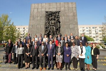 Dozens of U.N. ambassadors from around the world, including Israeli envoy Danny Danon (fifth from left, center row) in Warsaw, Poland, as part of a March of the Living delegation marking the 80th anniversary of the liberation of the Auschwitz concentration camp, April 23, 2025. Credit: Courtesy of the Israeli mission to the United Nations in New York.