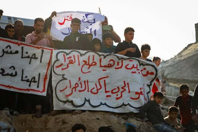 Palestinians in Beit Lahia, in the northern Gaza Strip, take part in an anti-Hamas protest calling to end the war with Israel, March 26, 2025. Photo by Flash90.
