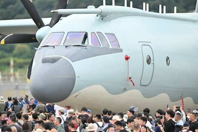 People look at a Shaanxi KJ-500A, a third-generation airborne early warning and control aircraft, during the 15th China International Aviation and Aerospace Exhibition in Zhuhai, in south China's Guangdong province on Nov. 15, 2024. Photo by Hector Retamal/AFP via Getty Images.
