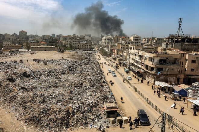 This picture shows a view of mounds of trash at the former site of the Firas Market which has been transformed into a landfill during the war in Gaza City on April 21, 2025. Photo by Omar Al-Qattaa/AFP via Getty Images.