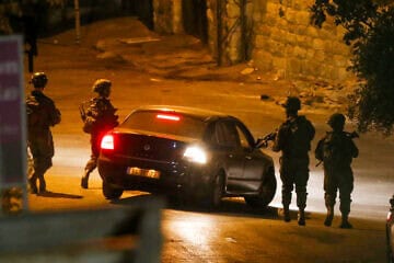Israeli soldiers confiscate stolen cars from Palestinians in Hebron, Aug. 13, 2024. Photo by Wisam Hashlamoun/Flash90.