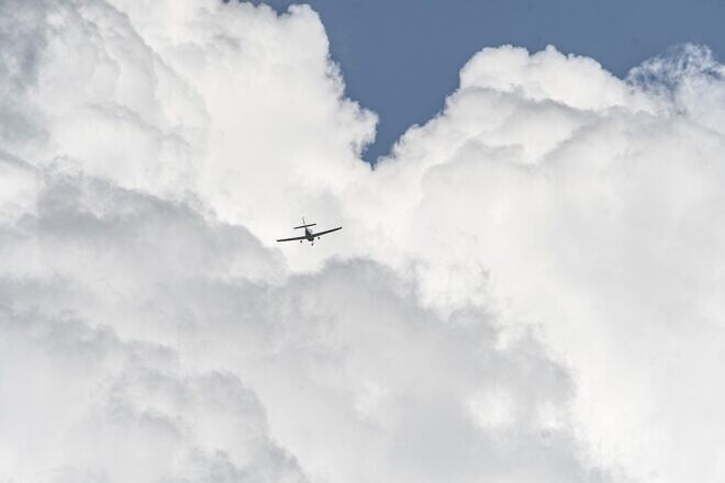 Aircraft flying through clouds. Credit: Sinousxl/Pixabay.