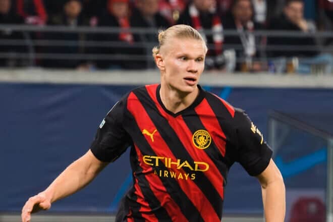 Erling Haaland plays for Manchester City against RB Leipzig in a UEFA Champions League match at the Red Bull Arena, Leipzig, Germany, on Feb. 22, 2023. Photo by Jacek Stanislawek/Wikimedia Commons.